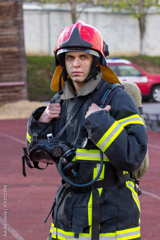 Portrait of a fireman with an axe