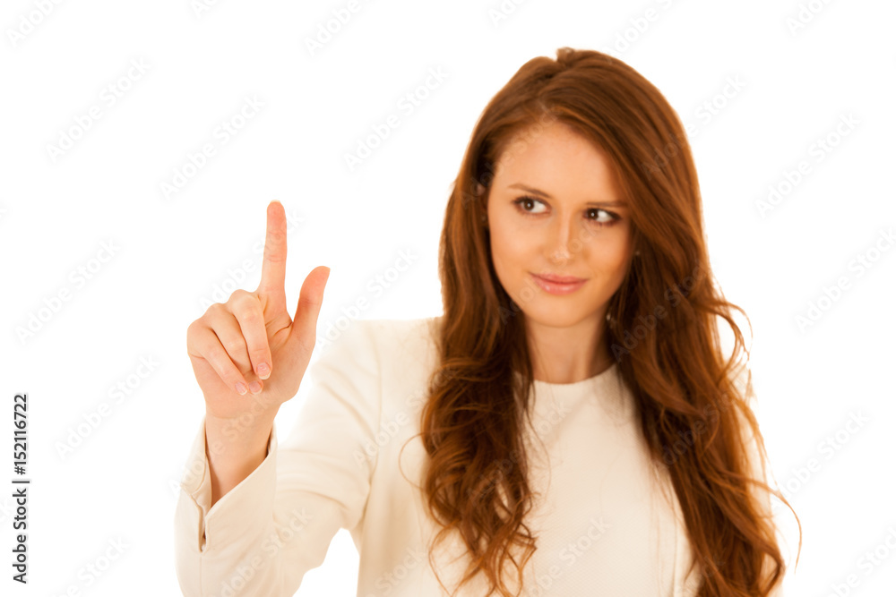 Attractive business woman pressing a virtual button Attractive business woman pressing a virtual button