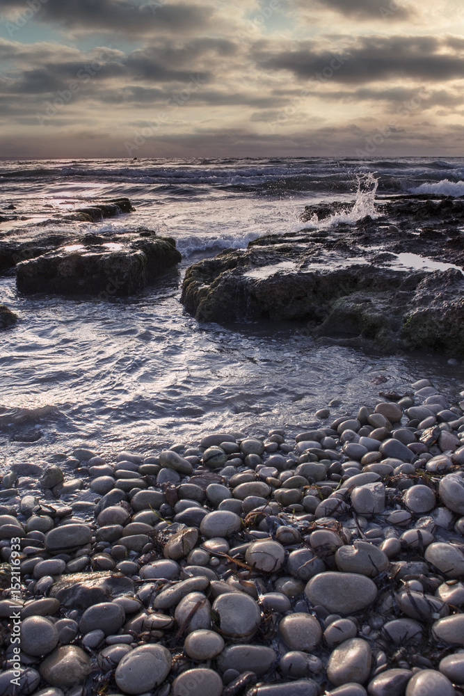 Obraz premium Sunrise on the beach and clouds