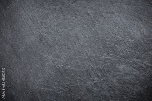 Dark grey and black slate background or texture photo