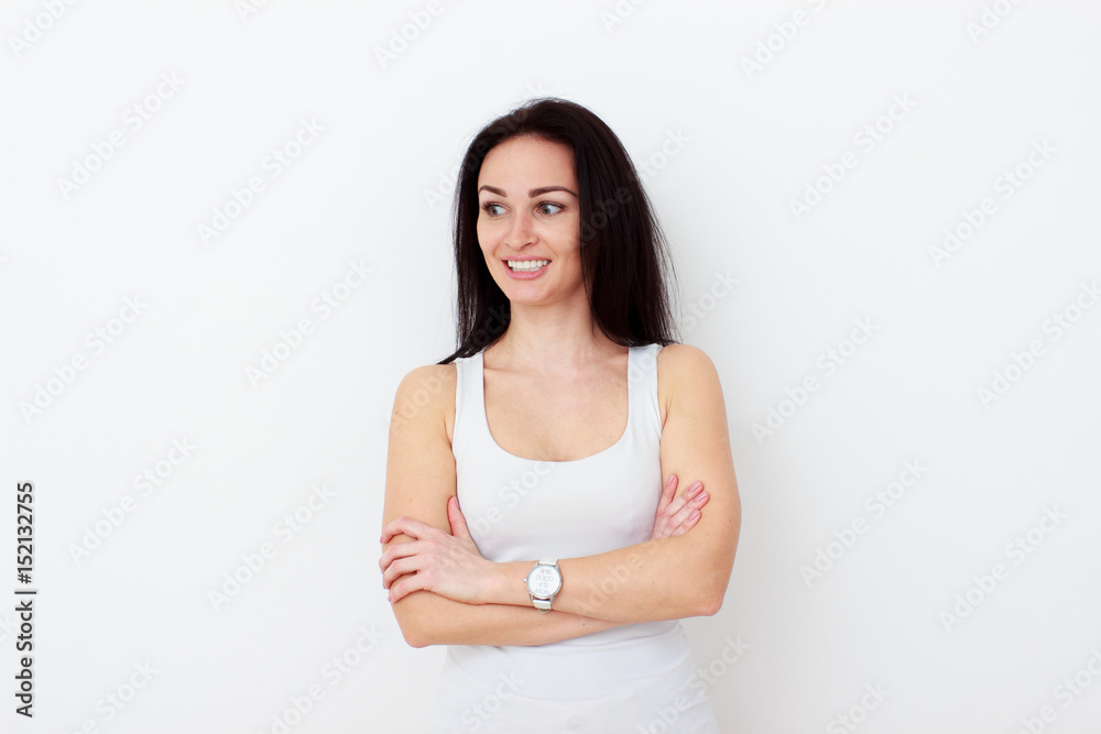 Beauty woman with white perfect smile looking at camera in studio Beauty woman with white perfect smile looking at camera in studio