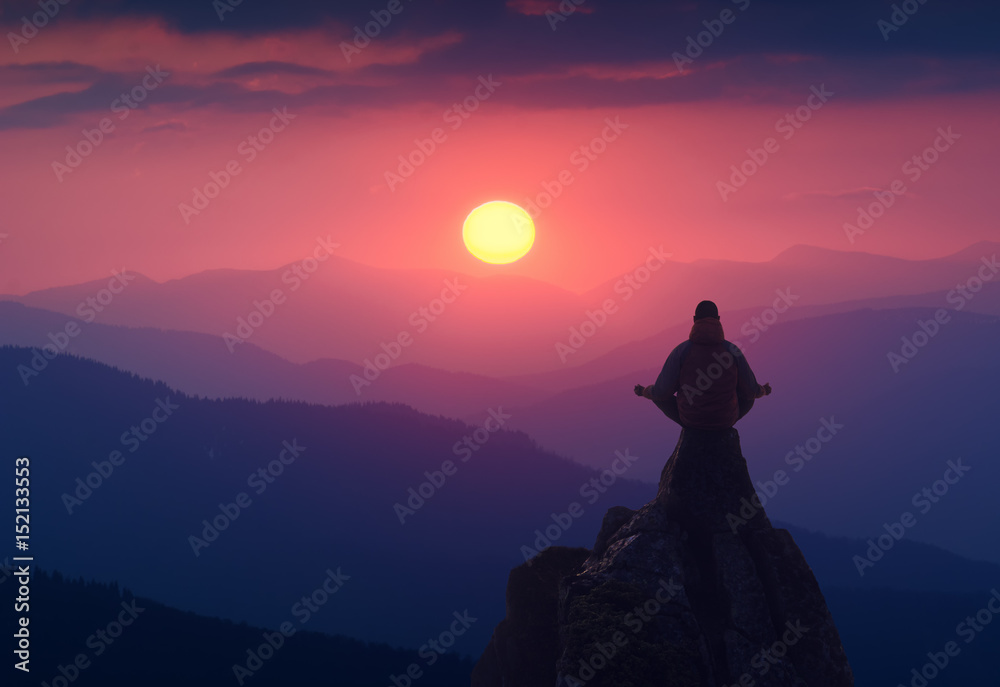 Fototapeta premium Meditation on a cliff