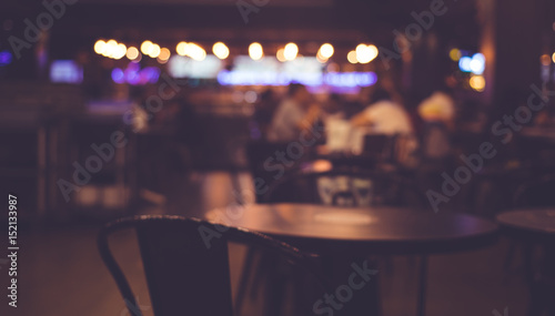 Blur of people in cafe,restaurant with lighting background