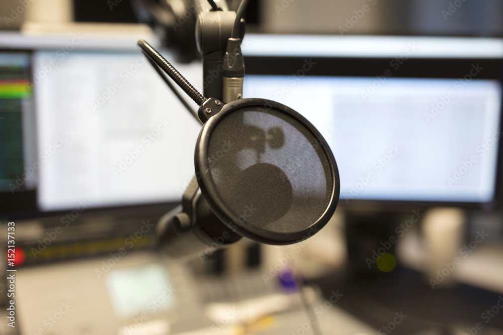 Close-up of a microphone in radio station broadcasting studio Close-up of a microphone in radio station broadcasting studio