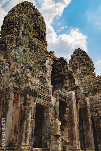 Long corridors and doorway of Prasat Bayon, the central temple of Angkor Thom Complex, Siem Reap, Cambodia. Ancient Khmer temple with frescoes and columns, World Heritage.