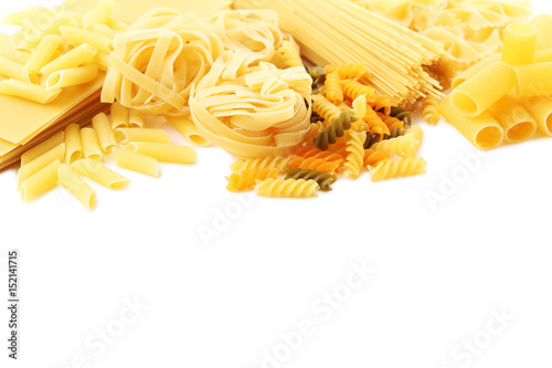 Different kinds of pasta on a white background