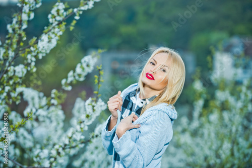 blooming tree and smiling girl  spring flower blossom and woman