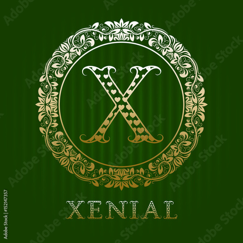 Golden logo template for xenial boutique. Vector monogram. photo