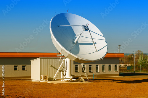 Satellite TV antenna in communication center . Telecommunications engineering