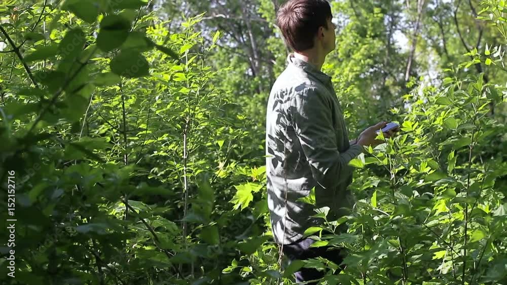 The car was lost in the forest. He found a way out with gps-navigator The car was lost in the forest. He found a way out with gps-navigator