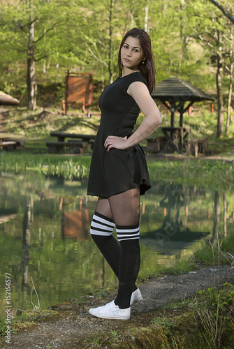 Obraz na płótnie Girl in nature posing w salonie