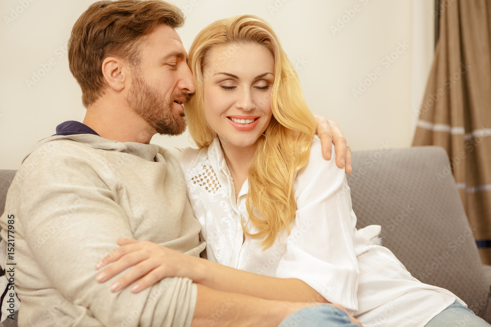 Affectionate mature couple relaxing at home Affectionate mature couple relaxing at home