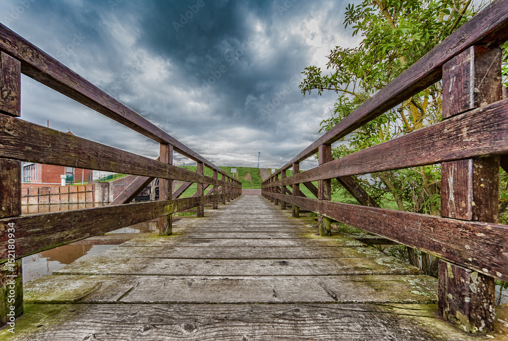 Old bridge to the dike of Greetsiel. Old bridge to the dike of Greetsiel.