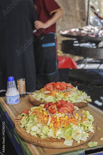 fresh salad with cabbage and vegetables on the fair