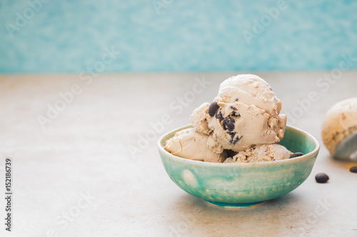 Chocolate Chip Cookie  Ice Cream In Rustic  Bowl. Selective focus, vintage toned image, blank space