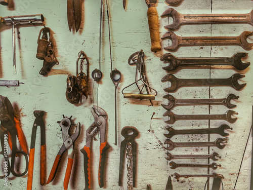 Mechanical utensils wall in a workshop on a light background