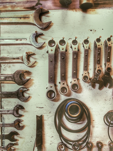 Mechanical utensils wall in a workshop on a light background