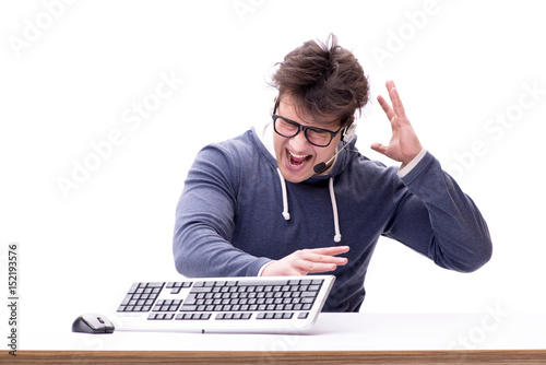 Funny nerd man working on computer isolated on white
