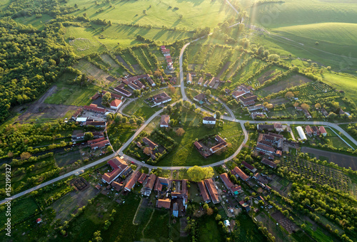 Tableau sur toile Beautiful unique circular village in Romania seen from above at the sunset by a