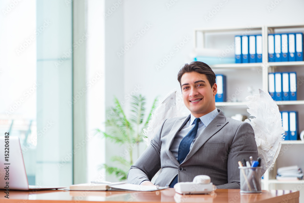 Angel investor concept with businessman and wings Angel investor concept with businessman and wings