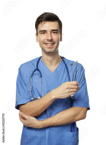 Handsome young dentist with...
