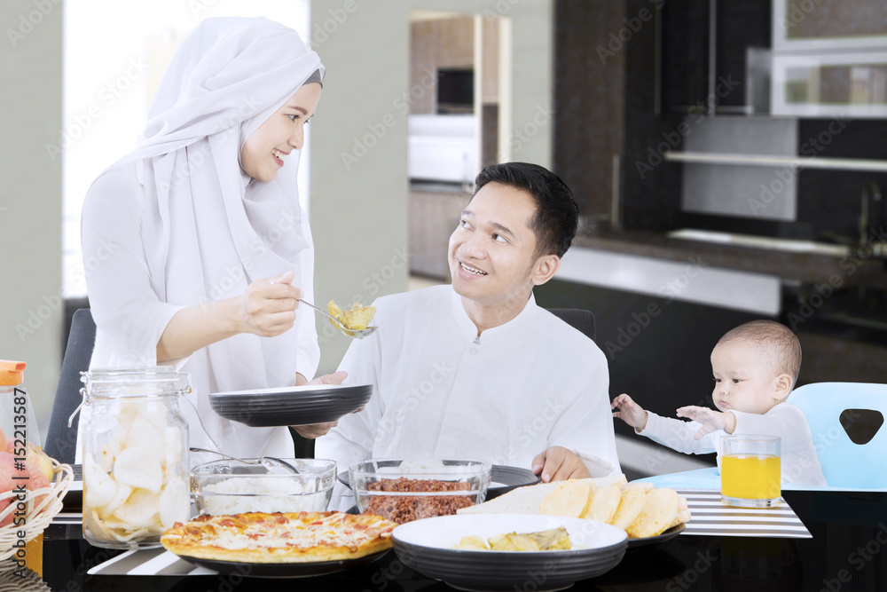Muslim family eating on table Muslim family eating on table