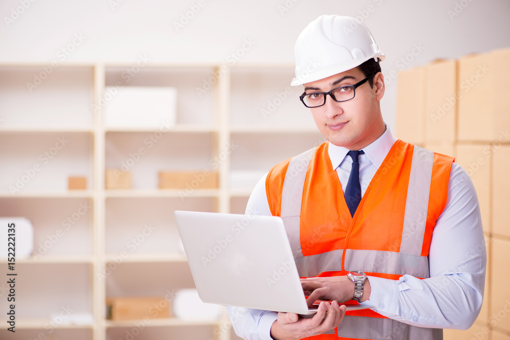 Man working in postal parcel delivery service office Man working in postal parcel delivery service office