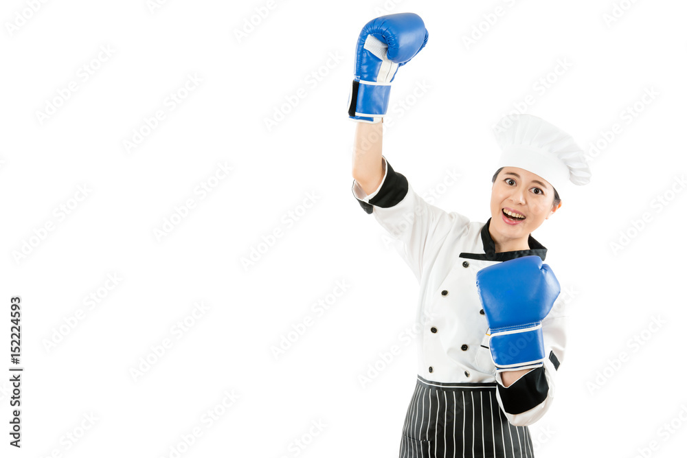 winning chef celebrating wearing boxing gloves winning chef celebrating wearing boxing gloves