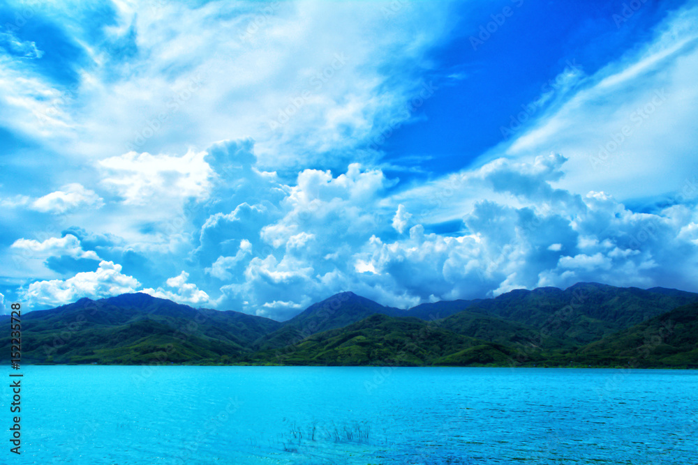 Mountain landscape with blue sky and fresh water lake background Mountain landscape with blue sky and fresh water lake background