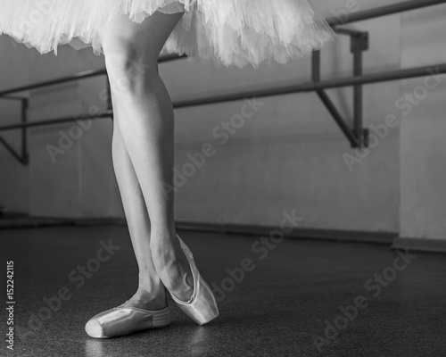 Long legs of ballerina in toeshoe photo