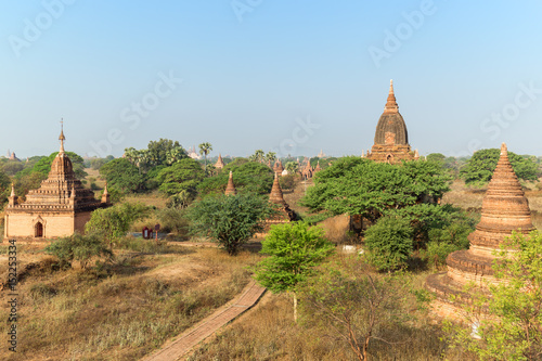 Scenic view of many temples and pagodas in the ancient plain of Bagan in Myanmar  Burma  on a sunny day.