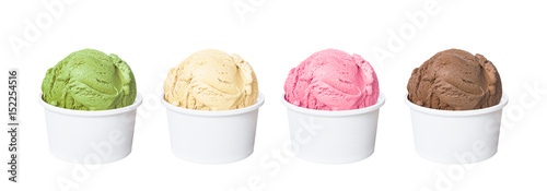 Photographie Ice cream scoops in white cups of chocolate, strawberry, vanilla and green tea f