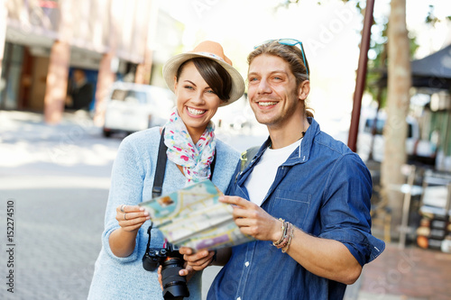 Girl and guy on the streets of a city
