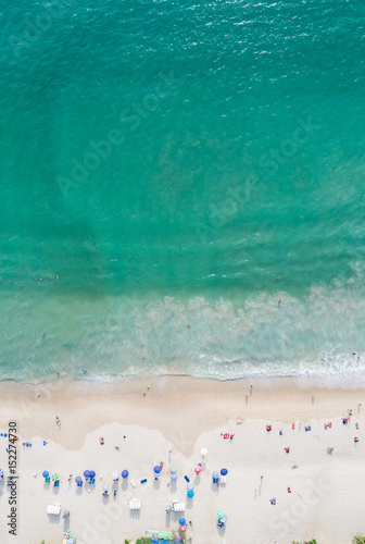 Patong beach in Phuket province, southern of Thailand. Patong beach is a very famous tourist destination in Phuket. Aerial view from flying drone
