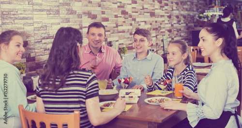 Big family in cafe