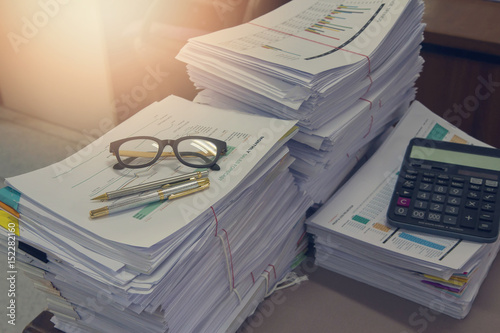 Business Concept, Pile of unfinished documents on office desk, Stack of business paper, Vintage Effect