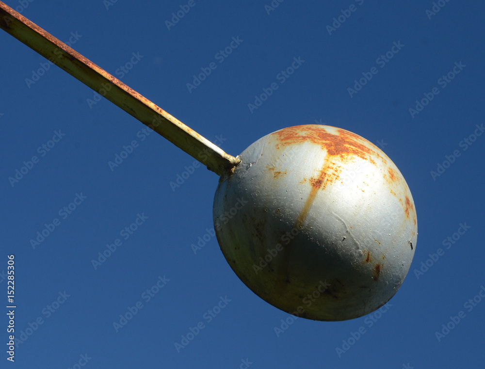 The convex cup side of a savonius rotor seen towards the blue sky. The convex cup side of a savonius rotor seen towards the blue sky.