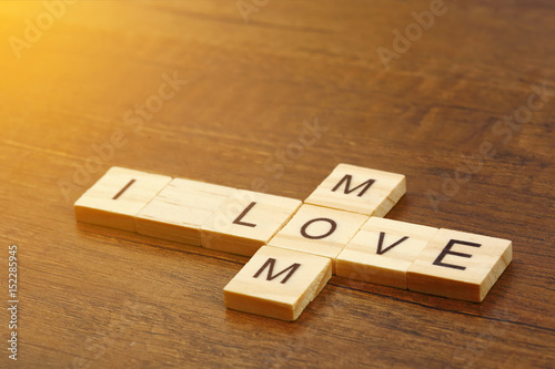 I love mom wording on wood background