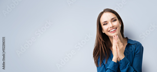 happy gesturing smiling young woman photo
