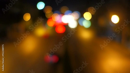 blur night traffic with bokeh light