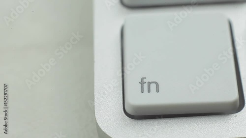 Macro video of function button on laptop keyboard