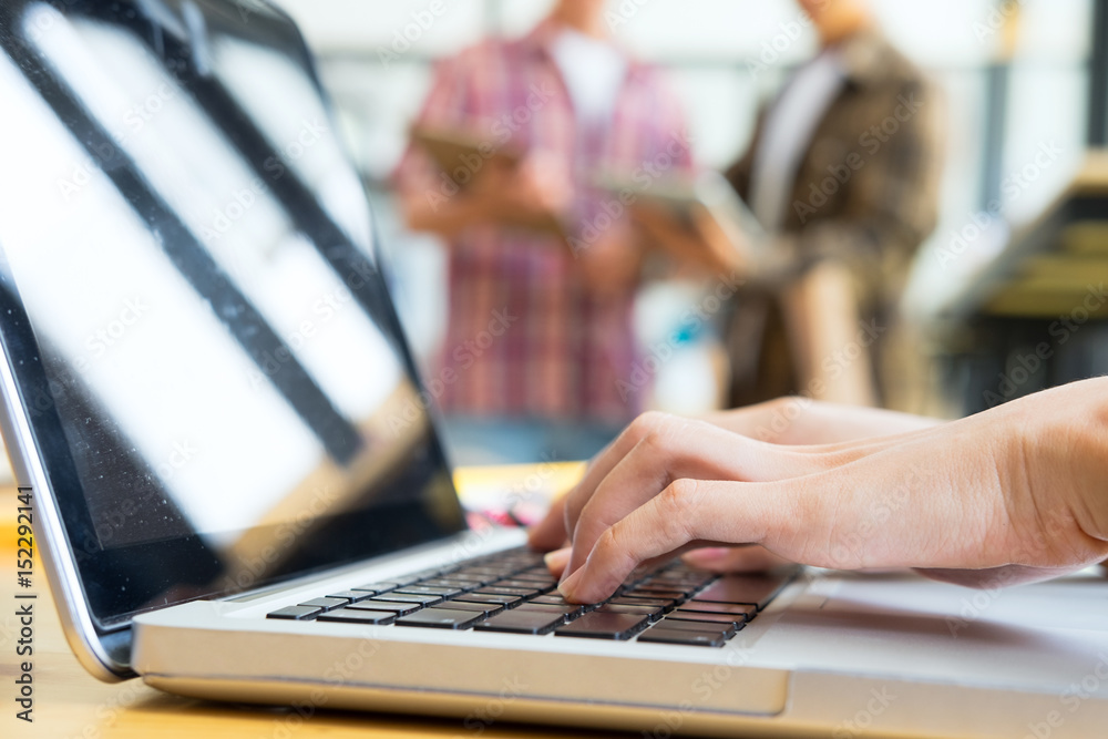 Young startup business hands typing on laptop keyboard. Young startup business hands typing on laptop keyboard.