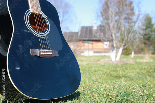 guitar outdoor near car photo