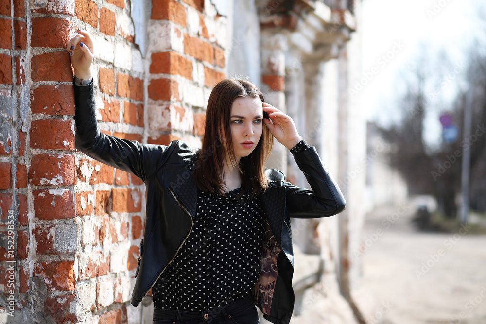 Girl on a walk through the spring city Girl on a walk through the spring city