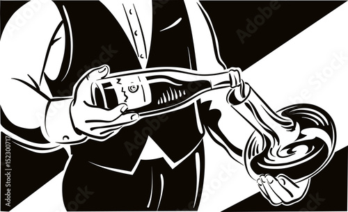 Young sommelier, pour the wine into a decanter, a bottle just uncorked.