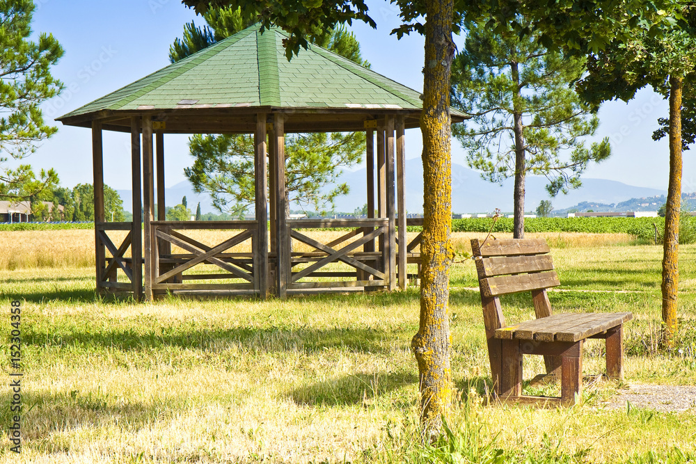 Covered wooden gazebos in a italian countyside (Tuscany - Italy)