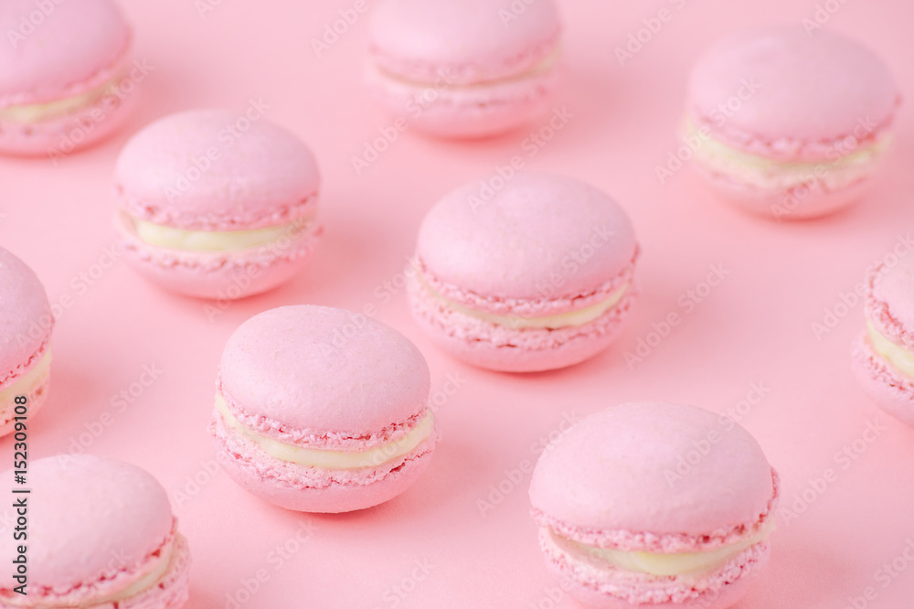 pink macaroons homemade, on pink background, diagonal, selective focus