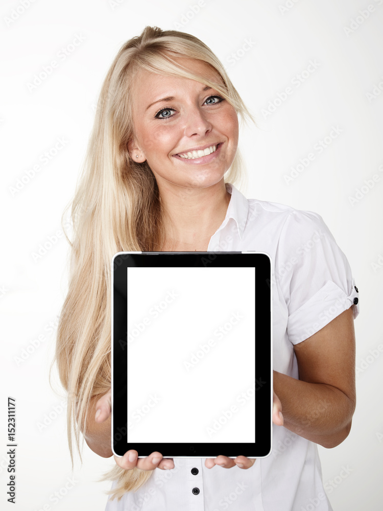 Woman presenting her tablet pc with copyspace Woman presenting her tablet pc with copyspace