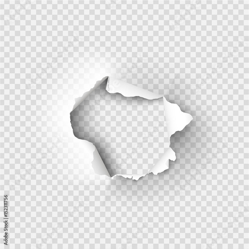 Holes torn in paper on transparent