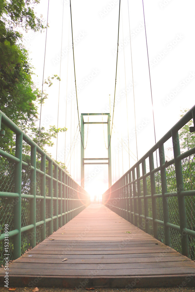 Obraz premium Rope bridge wood floor, Sweetheart on the steel bridge with blurred style